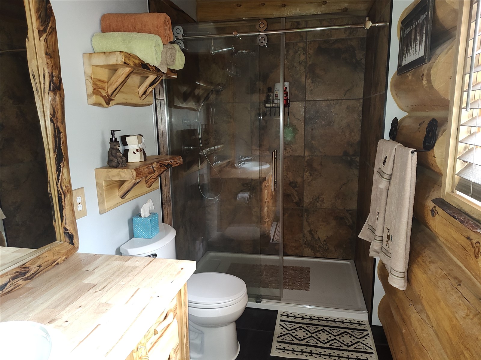 5 Arland Road Como, CO 80456 - Photo 20 of 33 a bathroom with a sink a toilet and shower
