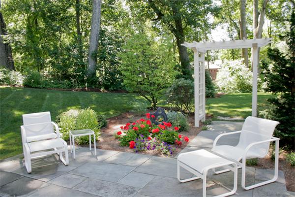 388 Lowell Road Concord, MA 01742 - Photo 11 of 11 a view of a chairs and table in the garden