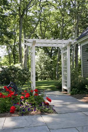 388 Lowell Road Concord, MA 01742 - Photo 10 of 11 a view of a garden with flowers and plants