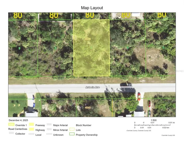 a view of a yard with an outdoor seating