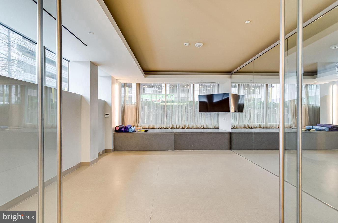 2501 M Street Northwest, Unit 207 Washington, DC 20037 - Photo 23 of 30 a living room with large window