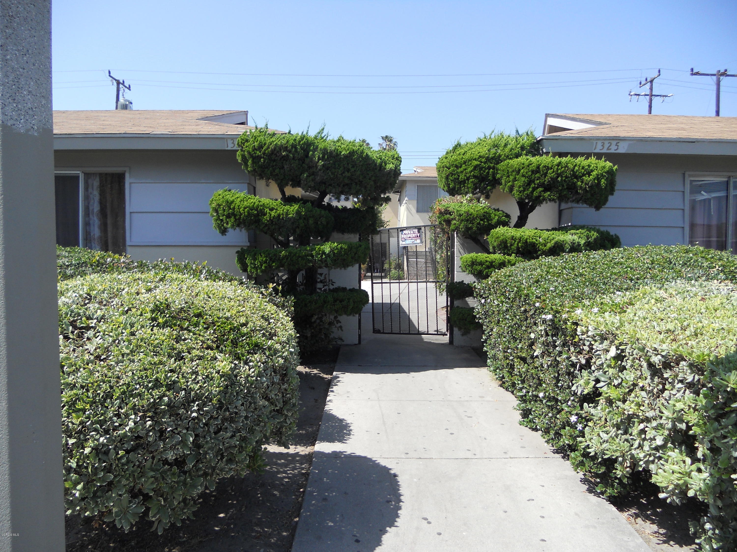 a view of a house with a garden