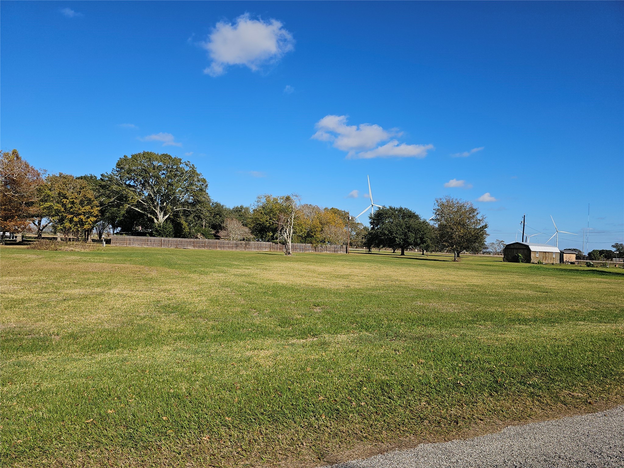 0 Chadwick Road Bay City, TX 77414 - Photo 3 of 8 a view of a field with an trees