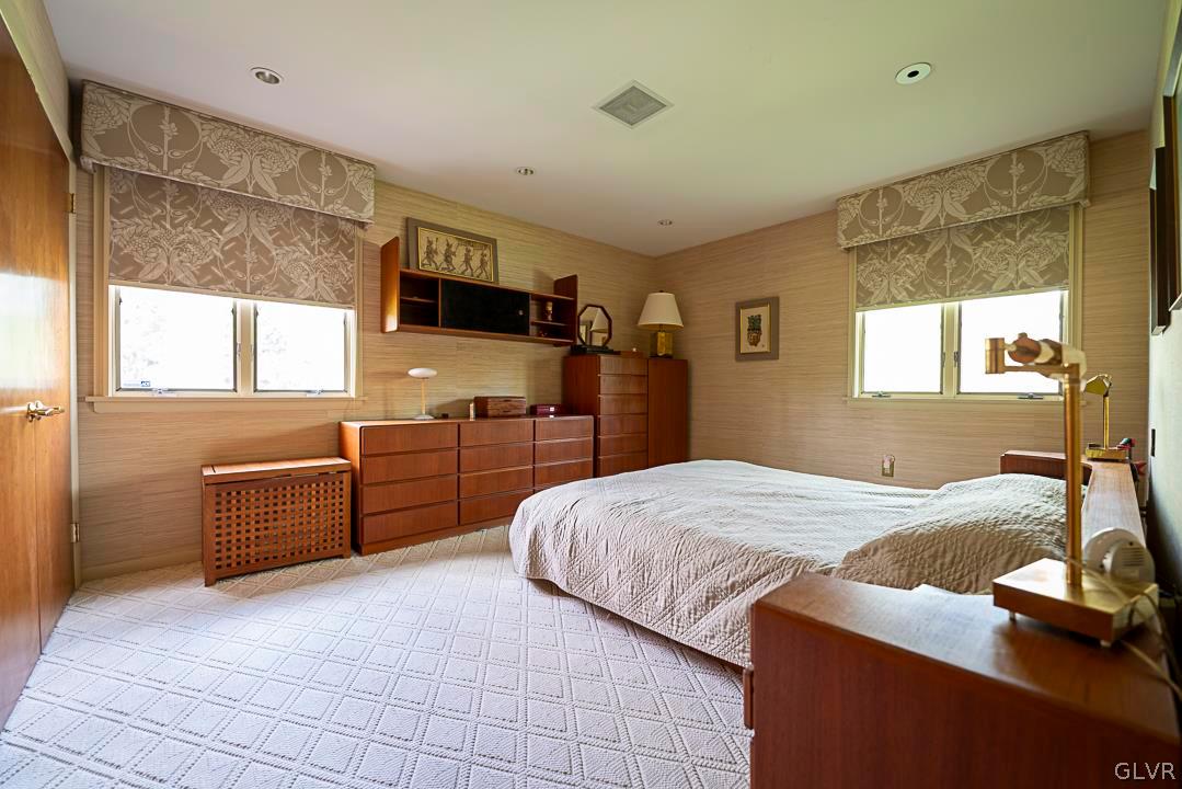 403 Georgetown Road Nazareth, PA 18064 - Photo 25 of 50 a bedroom with a bed and a flat screen tv