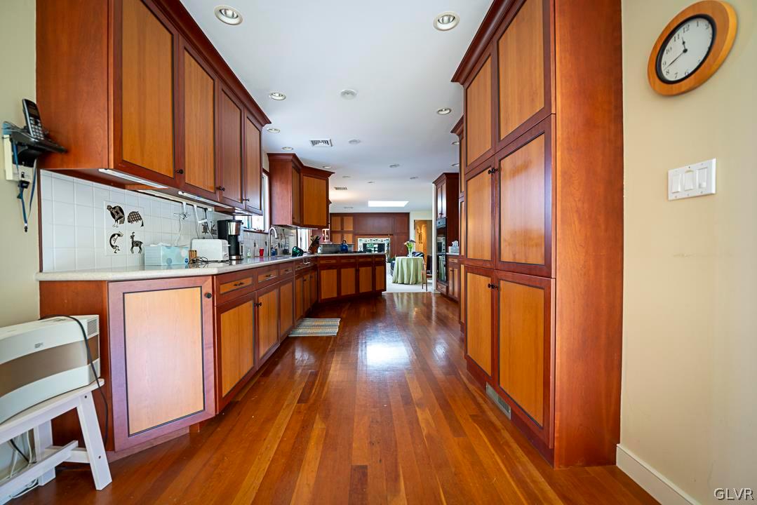 403 Georgetown Road Nazareth, PA 18064 - Photo 32 of 50 a view of a kitchen with wooden floor and electronic appliances
