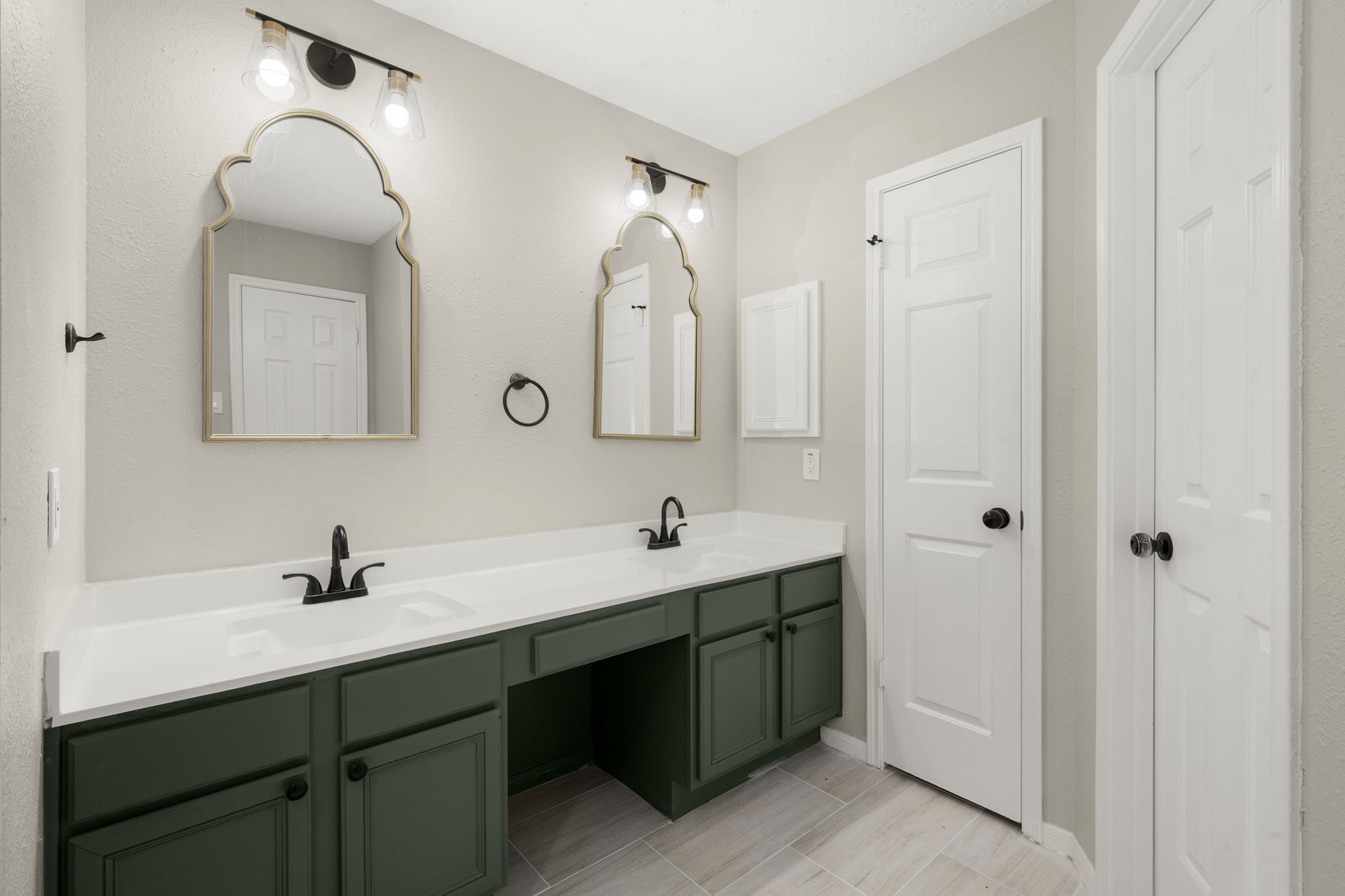 6615 Broken Stone Houston, TX 77084 - Photo 18 of 29 a bathroom with a double vanity sink mirror and