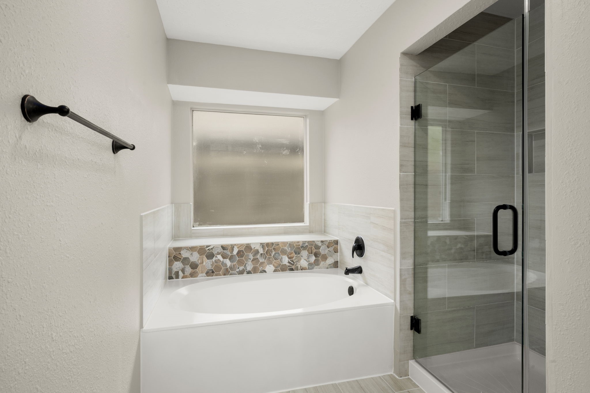 6615 Broken Stone Houston, TX 77084 - Photo 19 of 29 a bathroom with a tub sink