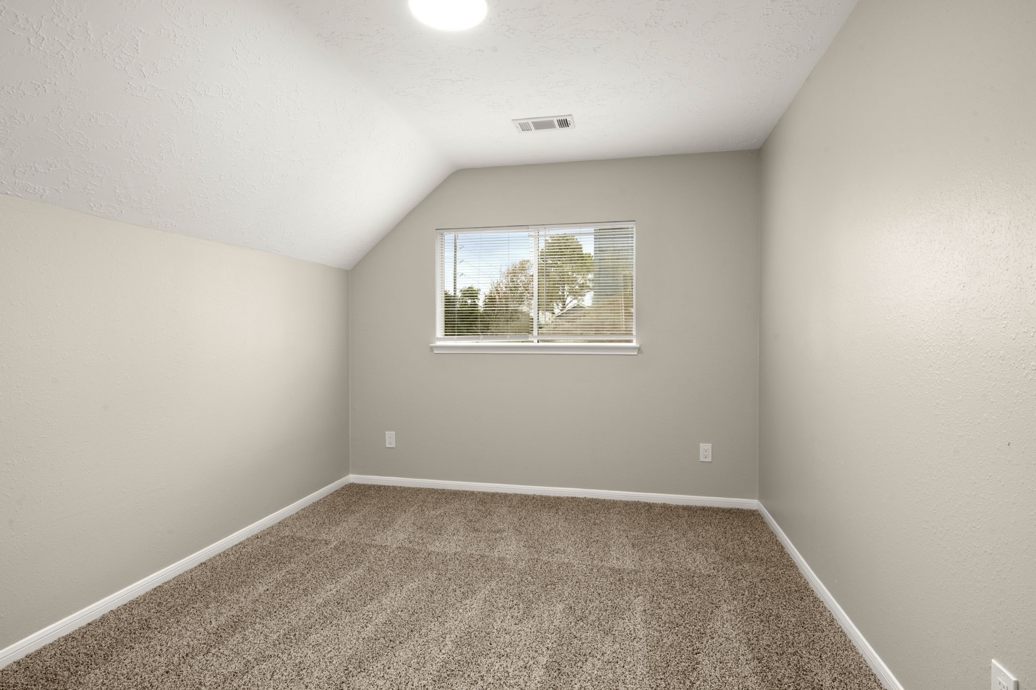 6615 Broken Stone Houston, TX 77084 - Photo 23 of 29 an empty room with windows