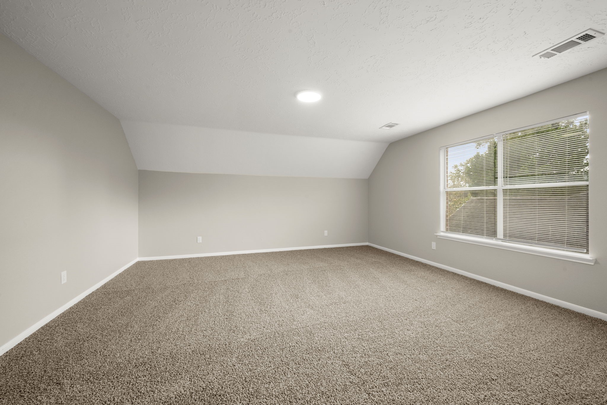 6615 Broken Stone Houston, TX 77084 - Photo 24 of 29 an empty room with a window