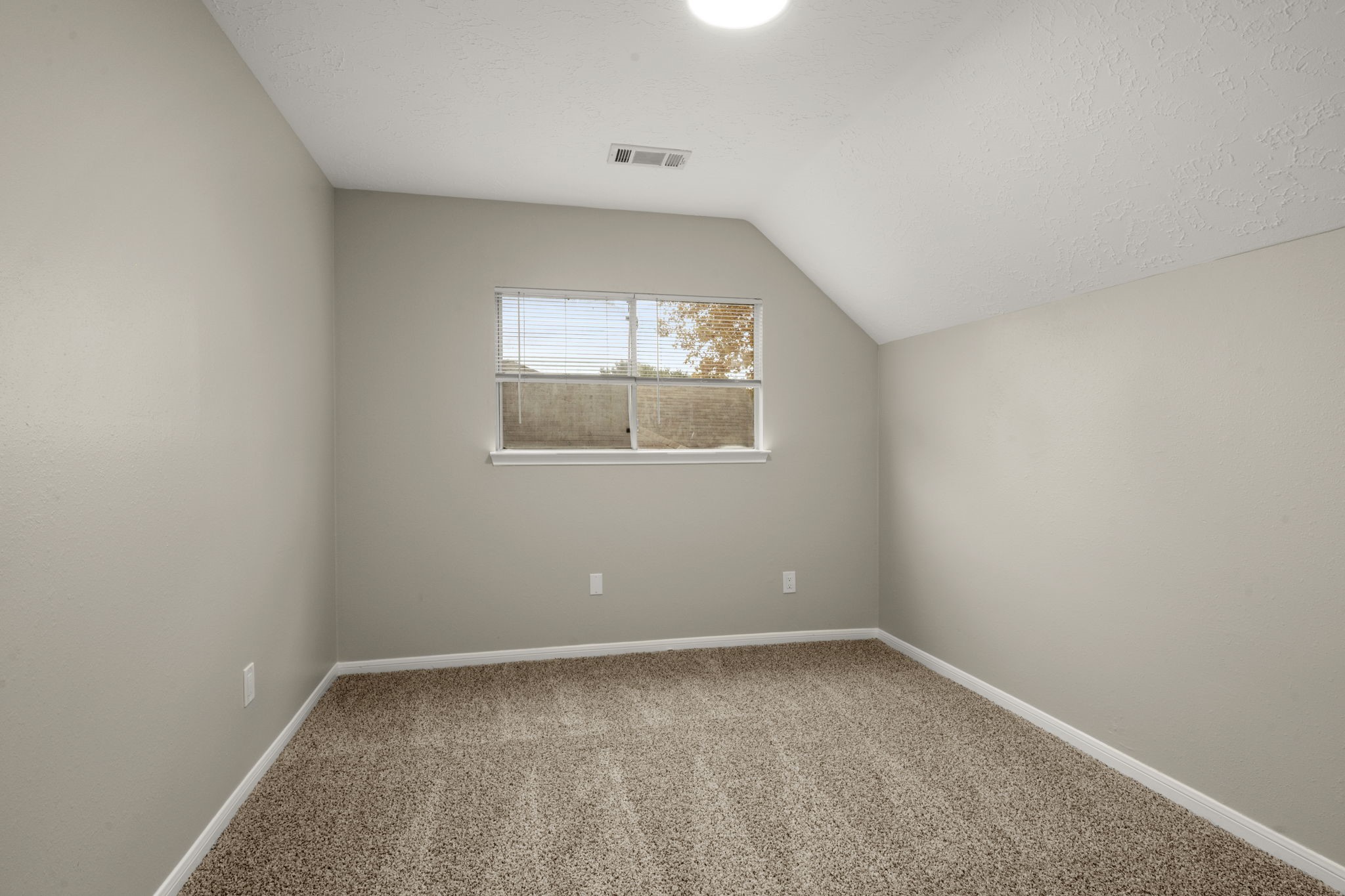 6615 Broken Stone Houston, TX 77084 - Photo 25 of 29 an empty room with a window
