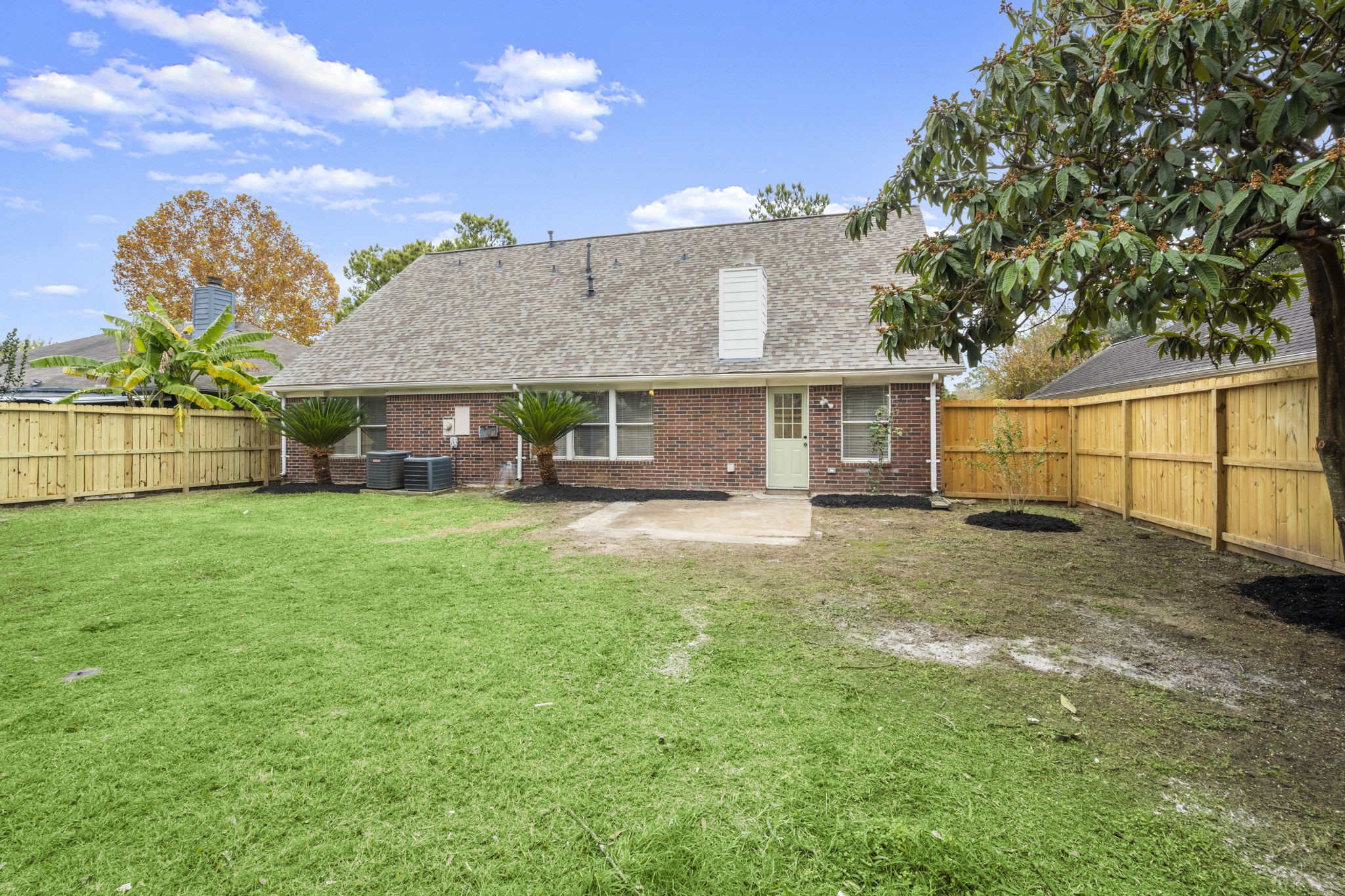 6615 Broken Stone Houston, TX 77084 - Photo 28 of 29 a view of an house with backyard space and garden
