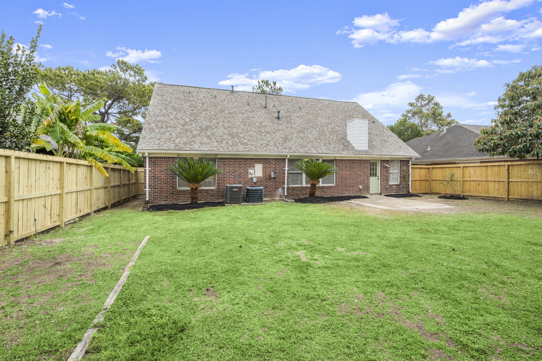 6615 Broken Stone Houston, TX 77084 - Photo 29 of 29 a view of a house with a backyard