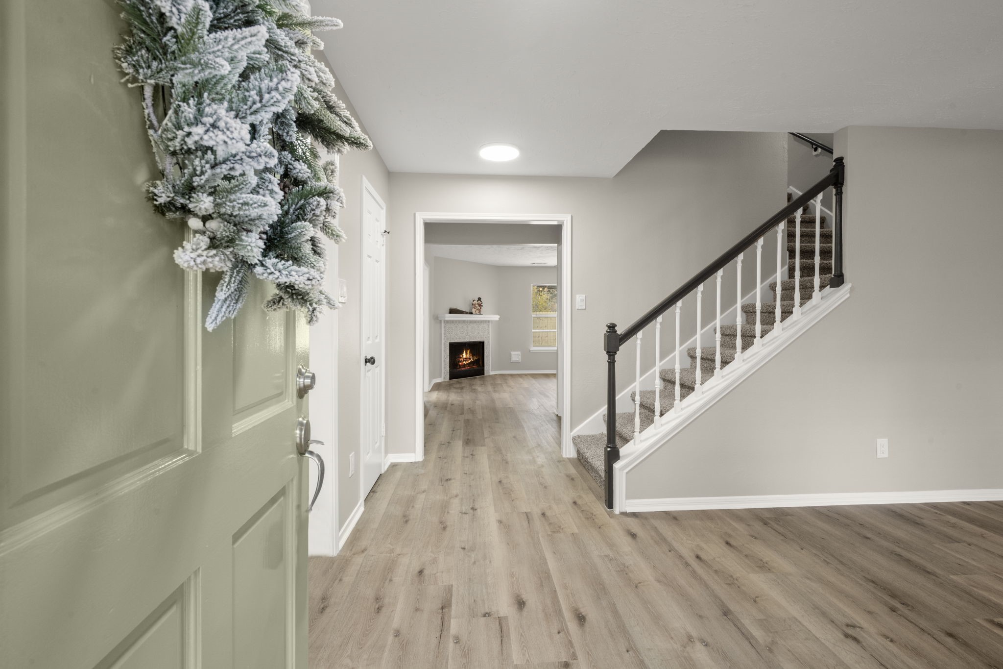 6615 Broken Stone Houston, TX 77084 - Photo 4 of 29 a view of entryway with wooden floor