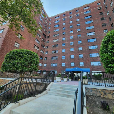 a view of a brick building from a balcony
