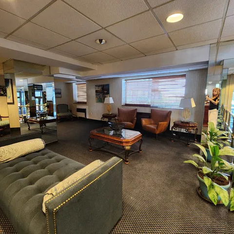 a living room with furniture and a couch