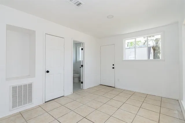 a view of an empty room with window