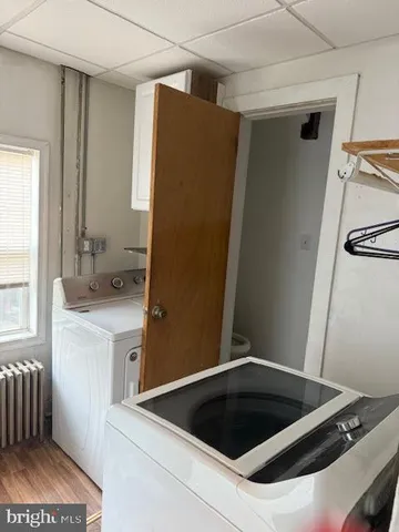 a kitchen with a refrigerator and a sink