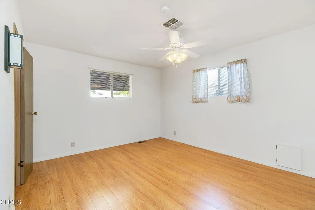 1273 South Rice Road, Unit 100 Ojai, CA 93023 - Photo 18 of 31 a view of empty room with wooden floor