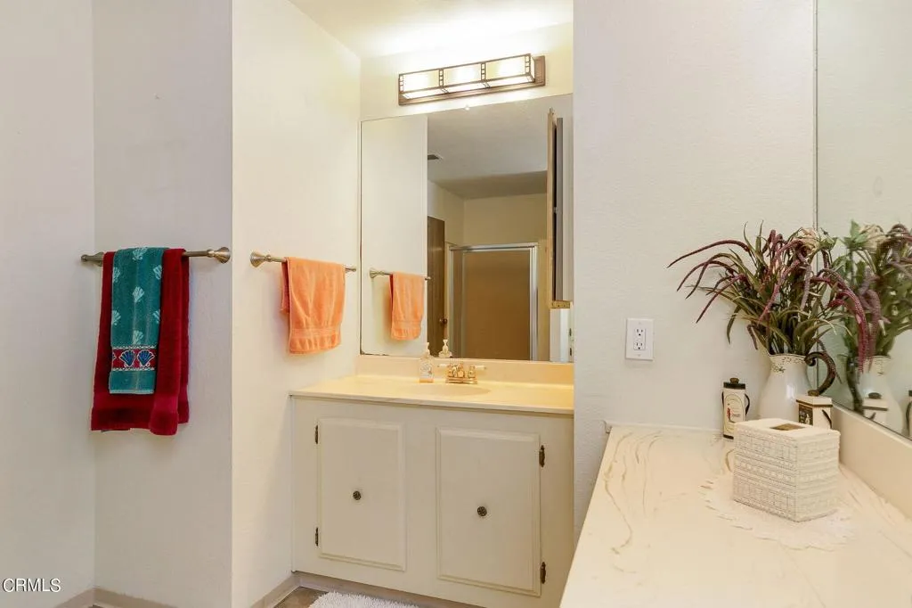 1273 South Rice Road, Unit 100 Ojai, CA 93023 - Photo 20 of 31 a bathroom with a sink and a mirror