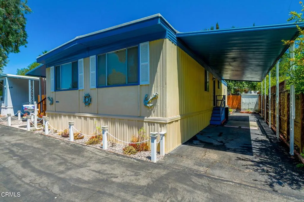 1273 South Rice Road, Unit 100 Ojai, CA 93023 - Photo 2 of 31 a view of a house with a yard