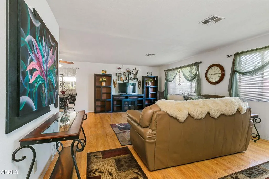 1273 South Rice Road, Unit 100 Ojai, CA 93023 - Photo 6 of 31 a bed sitting in a bedroom next to a window