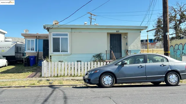 a view of a car in front of house