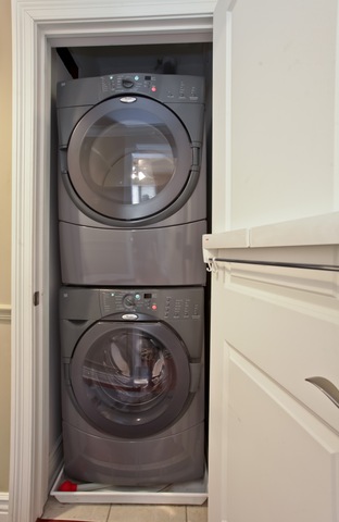 1255 West Addison Street, Unit 3 Chicago, IL 60613 - Photo 12 of 13 a close up view of washer and dryer