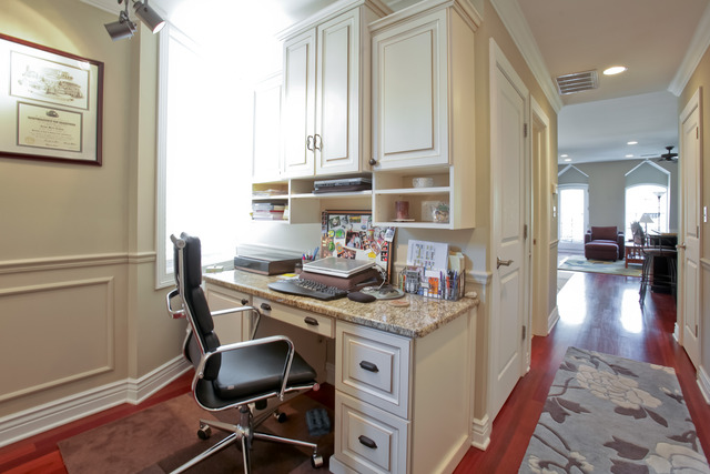 1255 West Addison Street, Unit 3 Chicago, IL 60613 - Photo 7 of 13 a kitchen with a sink cabinets and wooden floor