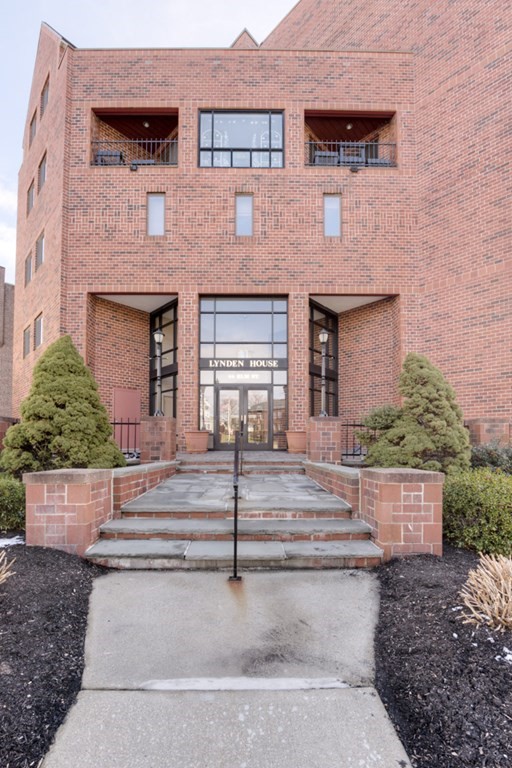 44 Elm Street, Unit 501 Worcester, MA 01609 - Photo 1 of 41 a front view of a house with garage