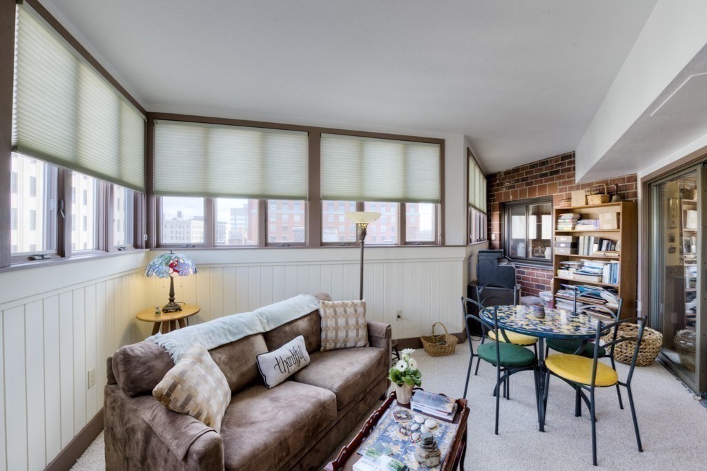 44 Elm Street, Unit 501 Worcester, MA 01609 - Photo 19 of 41 a living room with furniture and a window