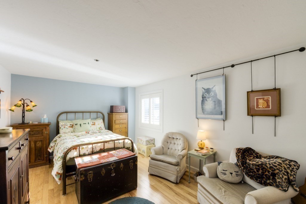 44 Elm Street, Unit 501 Worcester, MA 01609 - Photo 20 of 41 a bedroom with furniture and a couch