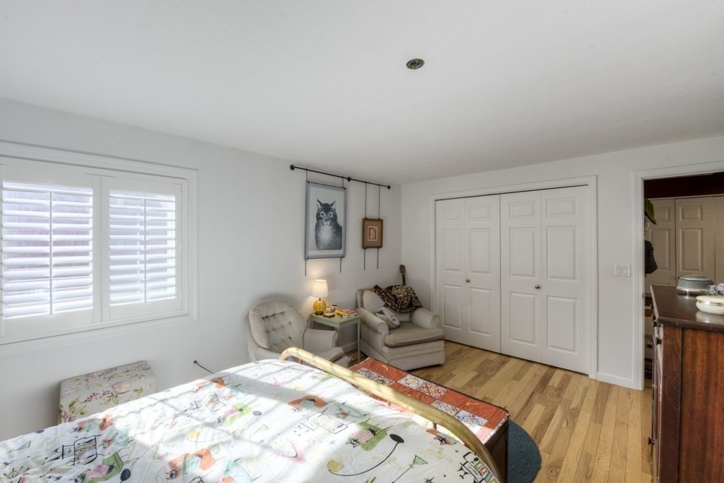 44 Elm Street, Unit 501 Worcester, MA 01609 - Photo 23 of 41 a bed room with a bed and a window