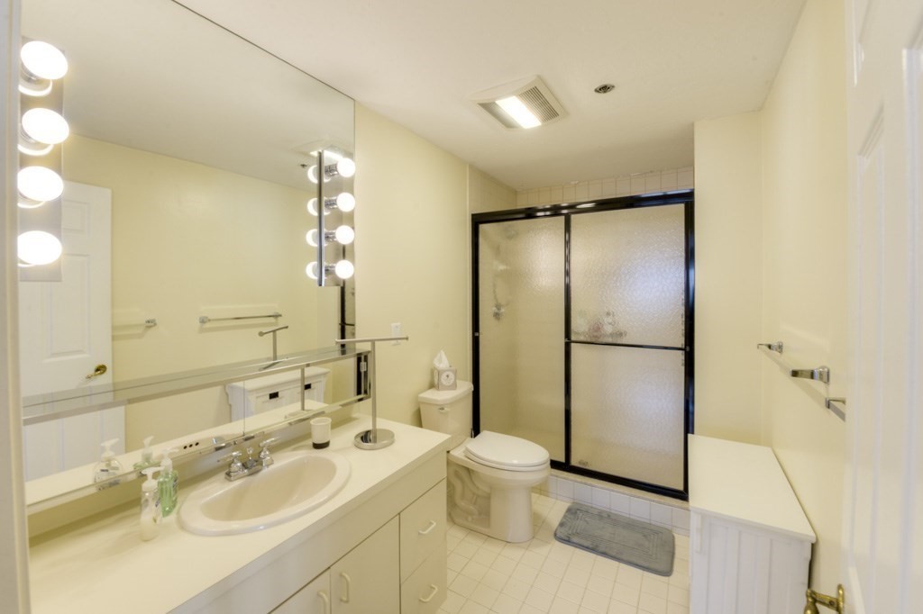 44 Elm Street, Unit 501 Worcester, MA 01609 - Photo 34 of 41 a bathroom with a sink toilet and shower