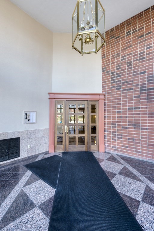 44 Elm Street, Unit 501 Worcester, MA 01609 - Photo 37 of 41 a front view of a house with a yard
