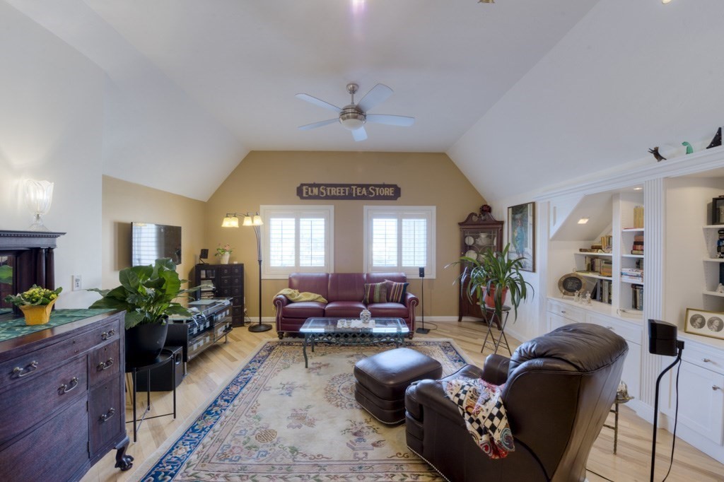 44 Elm Street, Unit 501 Worcester, MA 01609 - Photo 4 of 41 a living room with furniture potted plant and a window