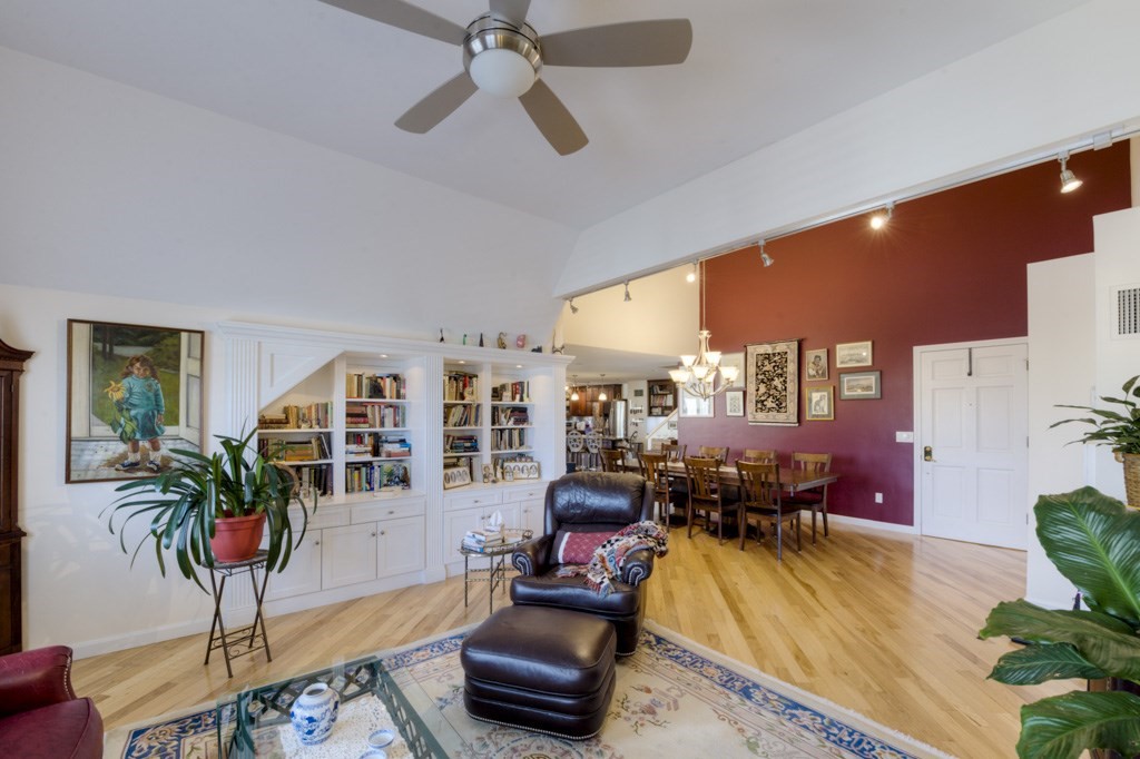 44 Elm Street, Unit 501 Worcester, MA 01609 - Photo 6 of 41 a living room with furniture and wooden floor