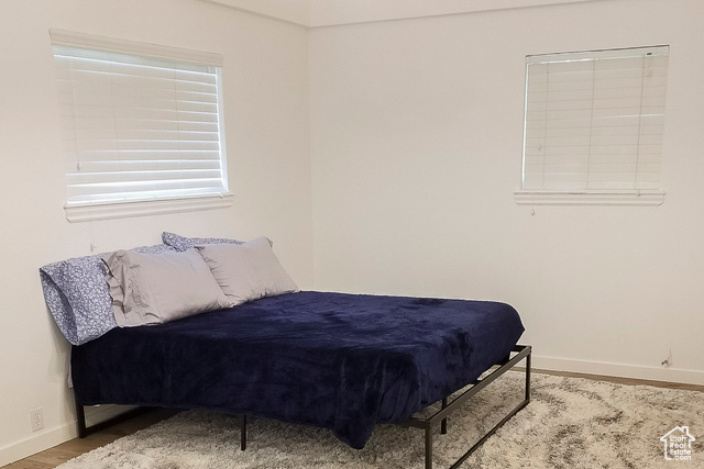 2855 South 1000 West Perry, UT 84302 - Photo 54 of 142 Bedroom featuring wood finished floors and baseboards