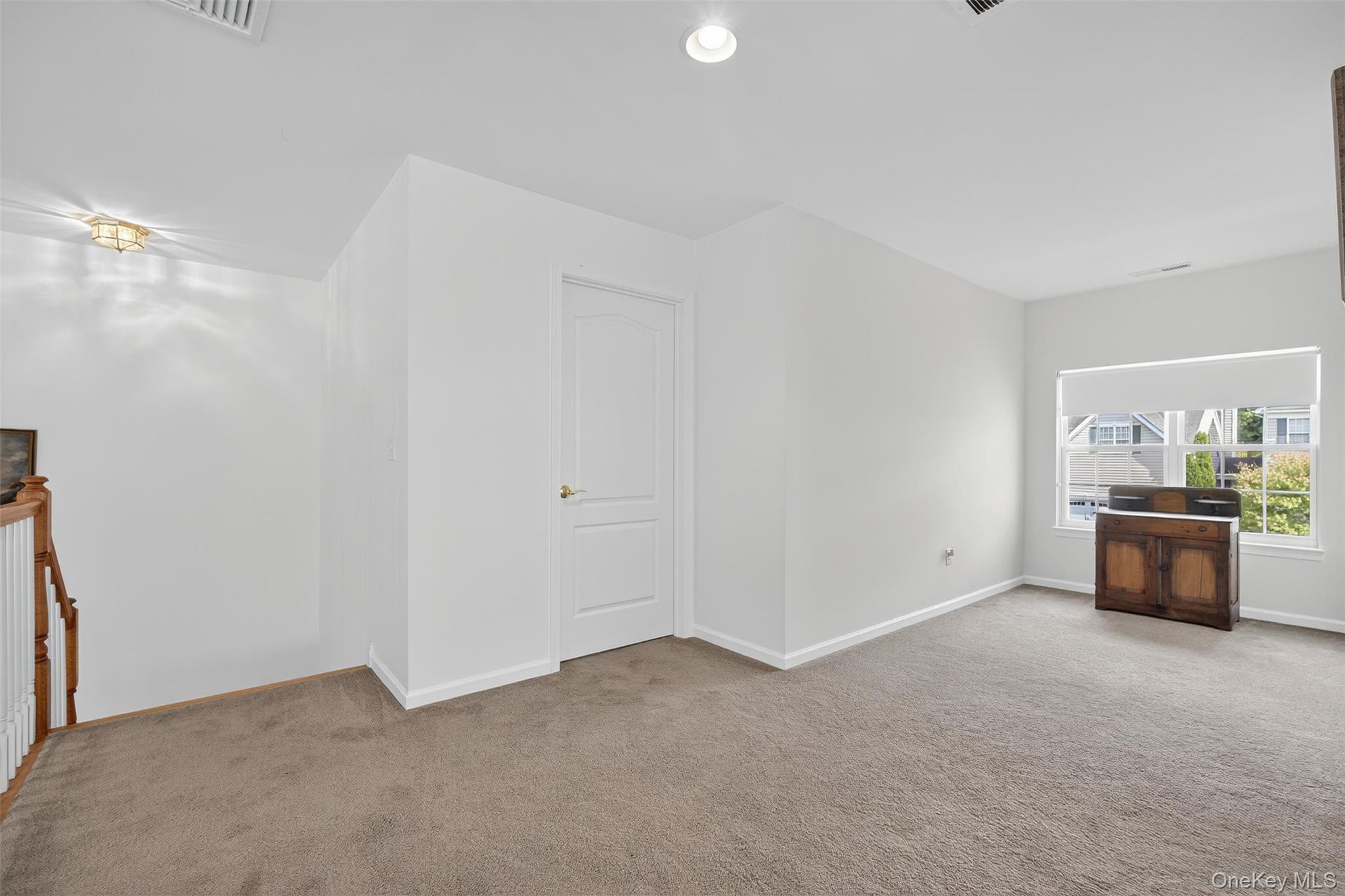 167 Stony Brook Road Fishkill, NY 12524 - Photo 21 of 42 Empty room featuring light colored carpet and recessed lighting