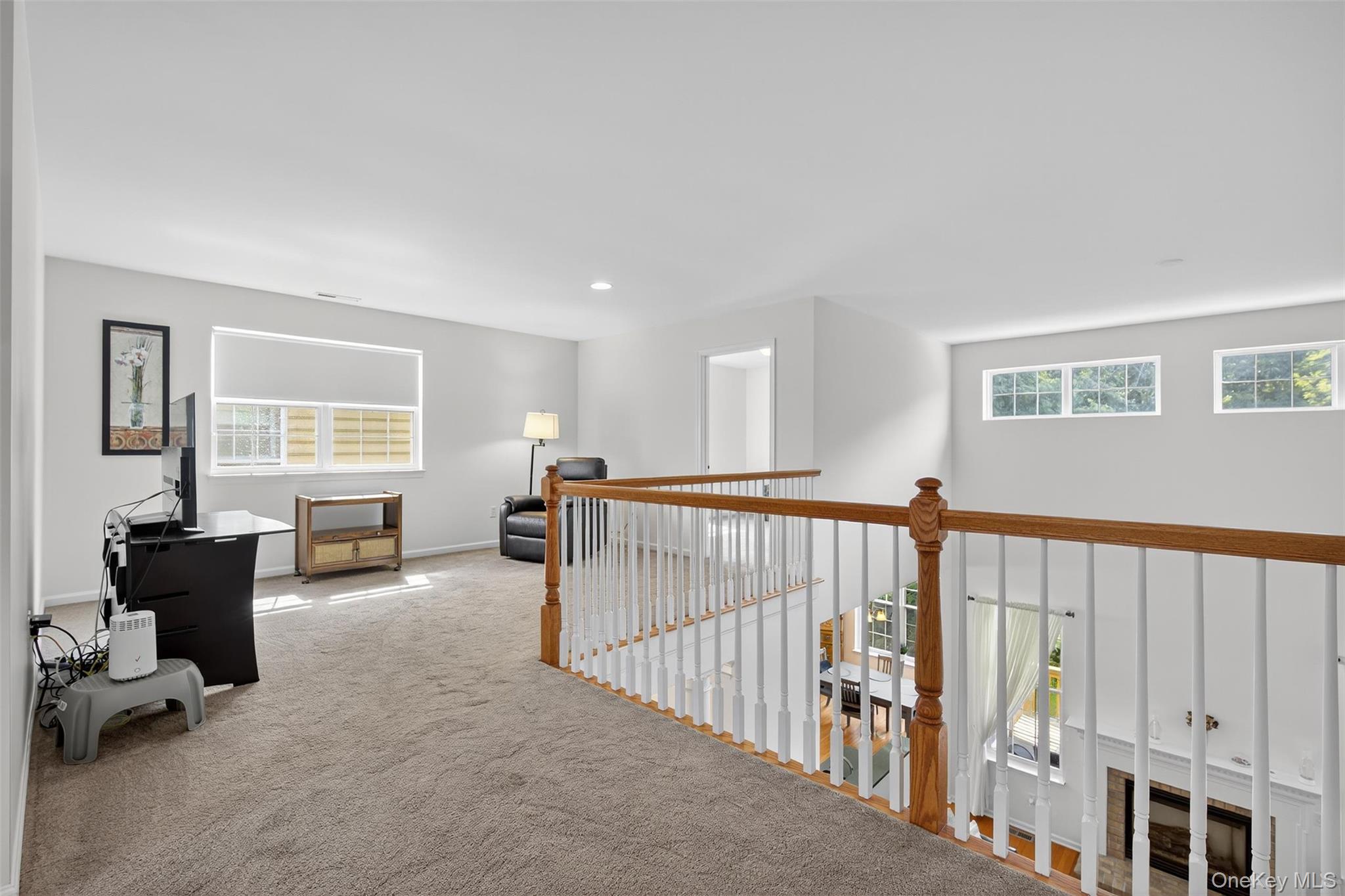 167 Stony Brook Road Fishkill, NY 12524 - Photo 23 of 42 Hall with plenty of natural light, carpet, and recessed lighting
