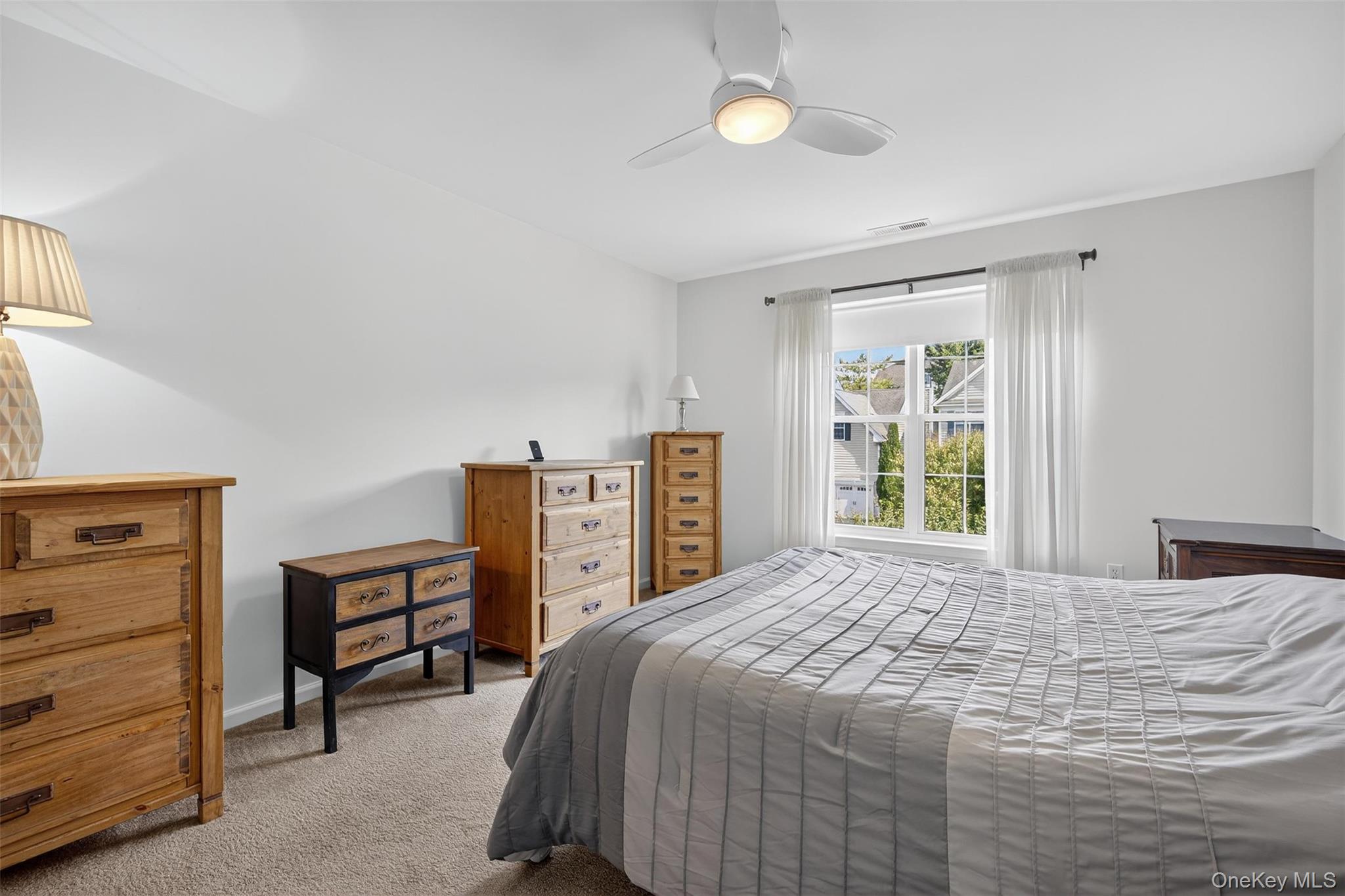 167 Stony Brook Road Fishkill, NY 12524 - Photo 24 of 42 Carpeted bedroom featuring ceiling fan and baseboards