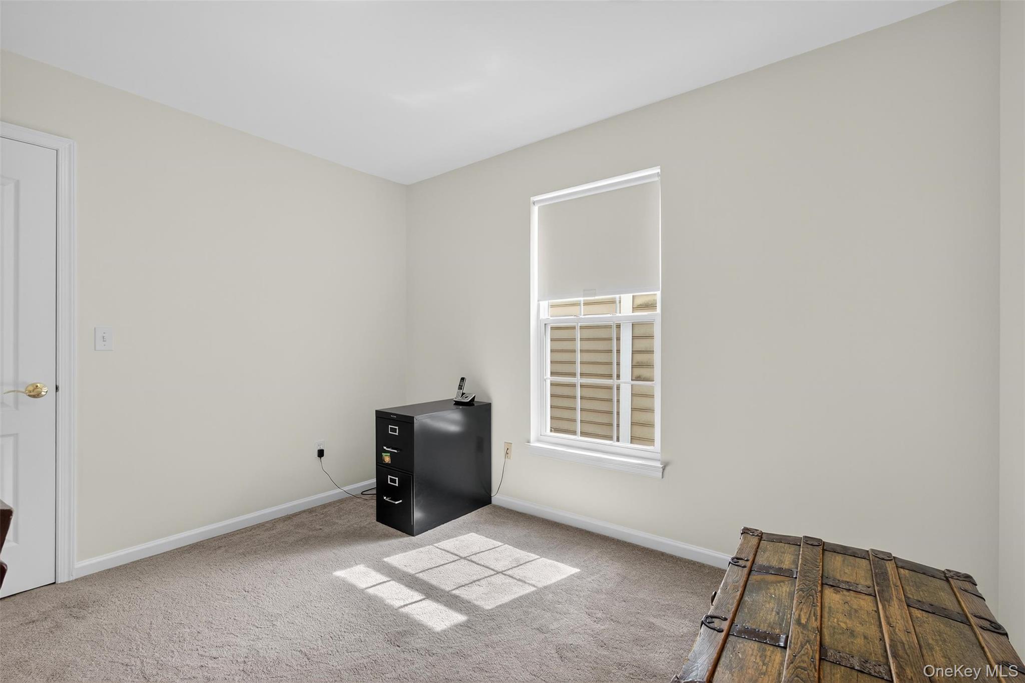 167 Stony Brook Road Fishkill, NY 12524 - Photo 30 of 42 Unfurnished bedroom featuring carpet and baseboards