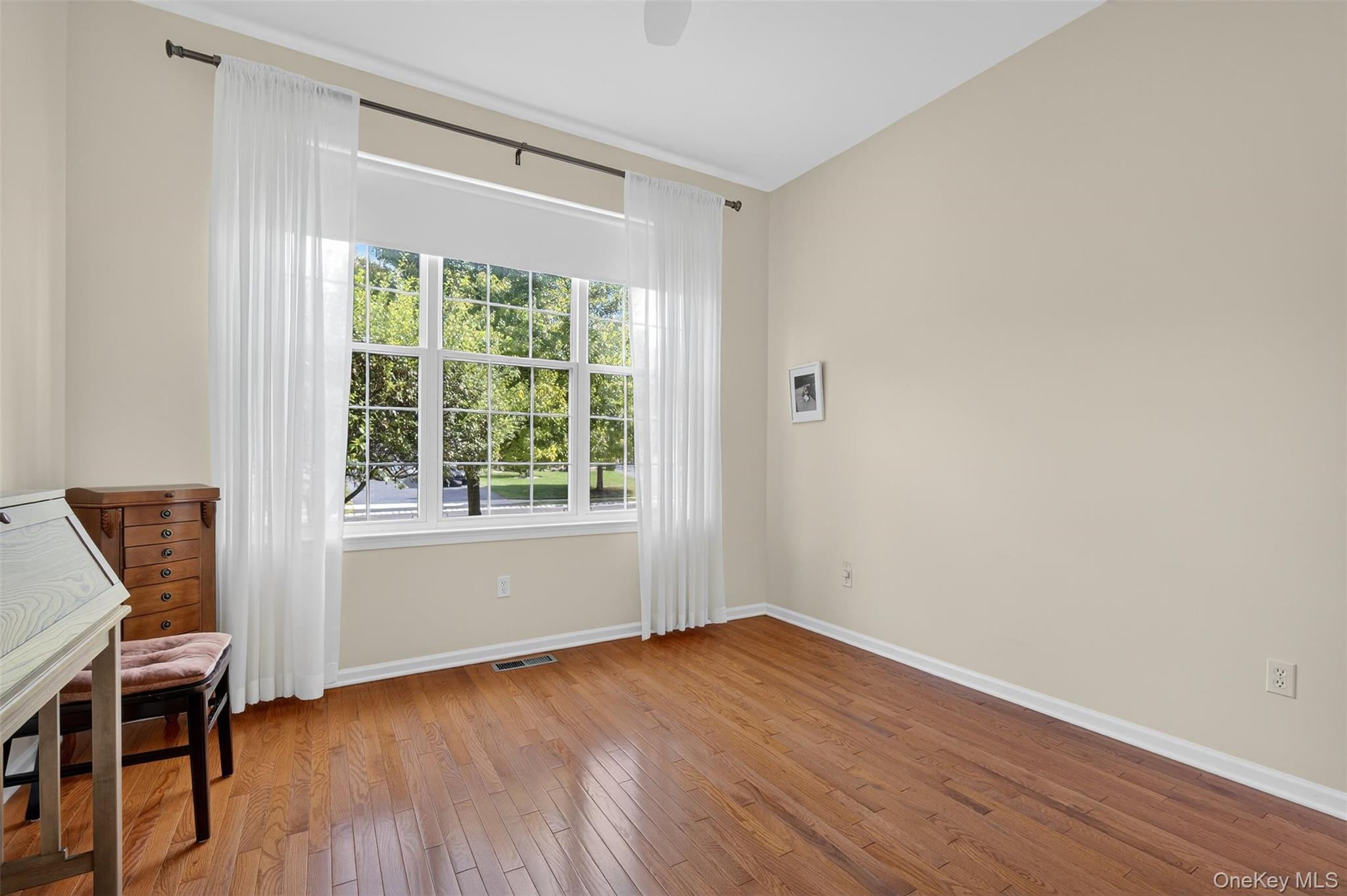 167 Stony Brook Road Fishkill, NY 12524 - Photo 31 of 42 Unfurnished room featuring light wood-style floors and a ceiling fan