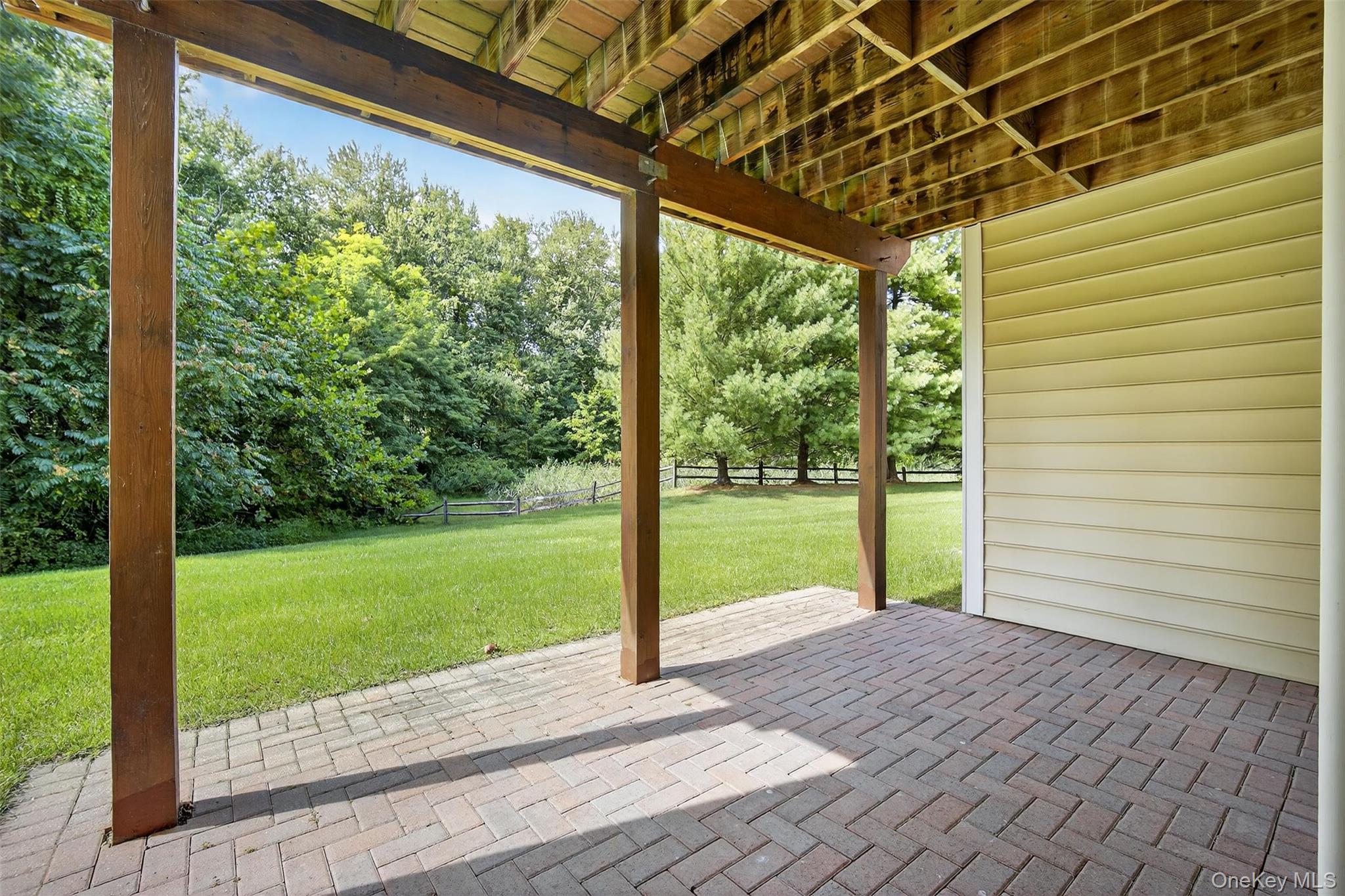 167 Stony Brook Road Fishkill, NY 12524 - Photo 37 of 42 View of patio / terrace with view of wooded area