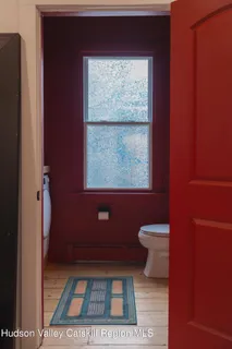 a bathroom with a toilet