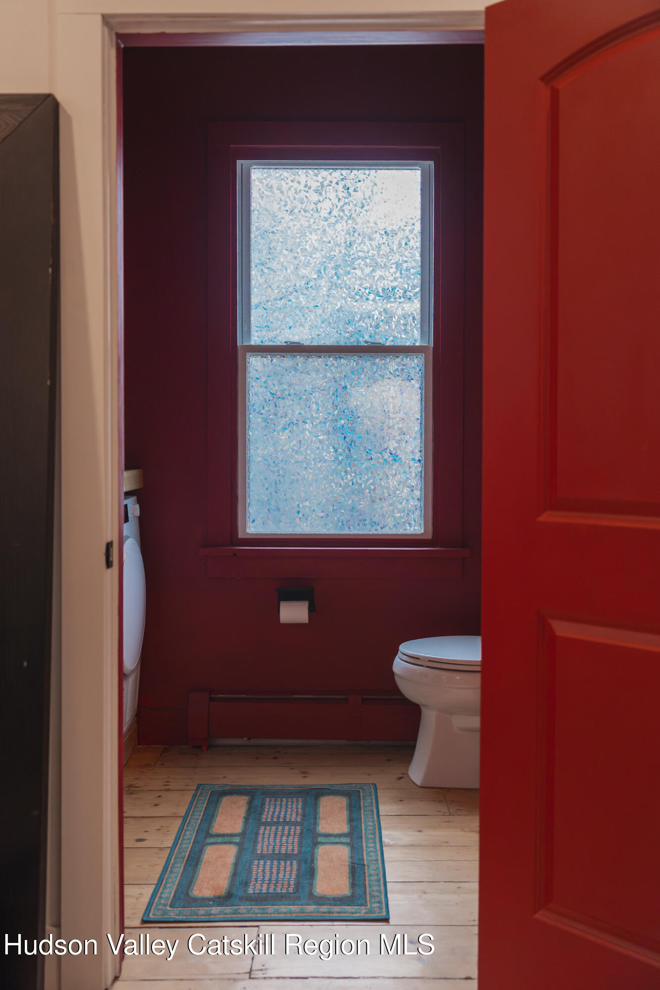 517 State Street Hudson, NY 12534 - Photo 17 of 36 a bathroom with a toilet