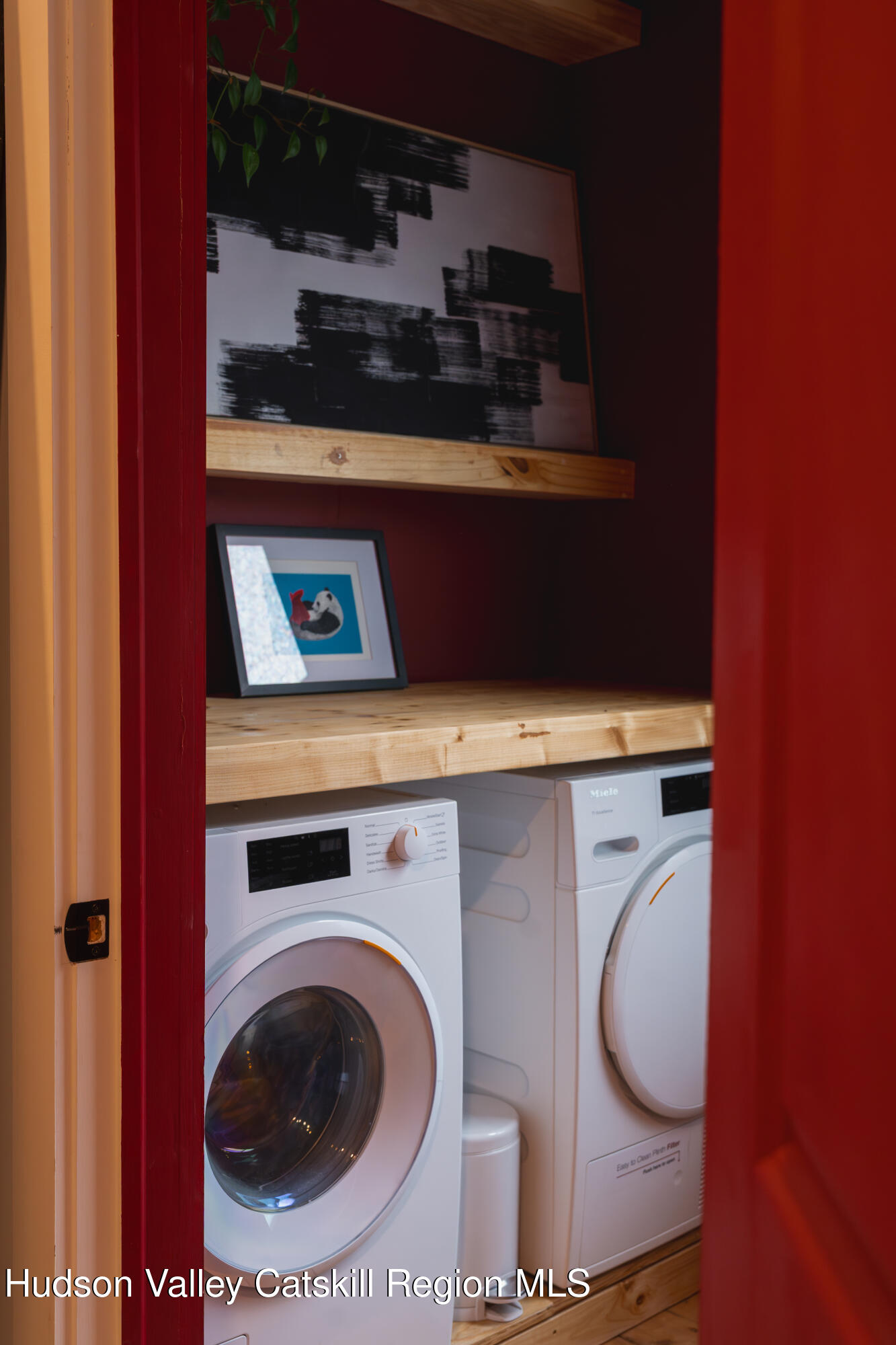 517 State Street Hudson, NY 12534 - Photo 18 of 36 a close view of a utility room with dryer and washer