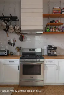 a kitchen with appliances cabinets and a counter top