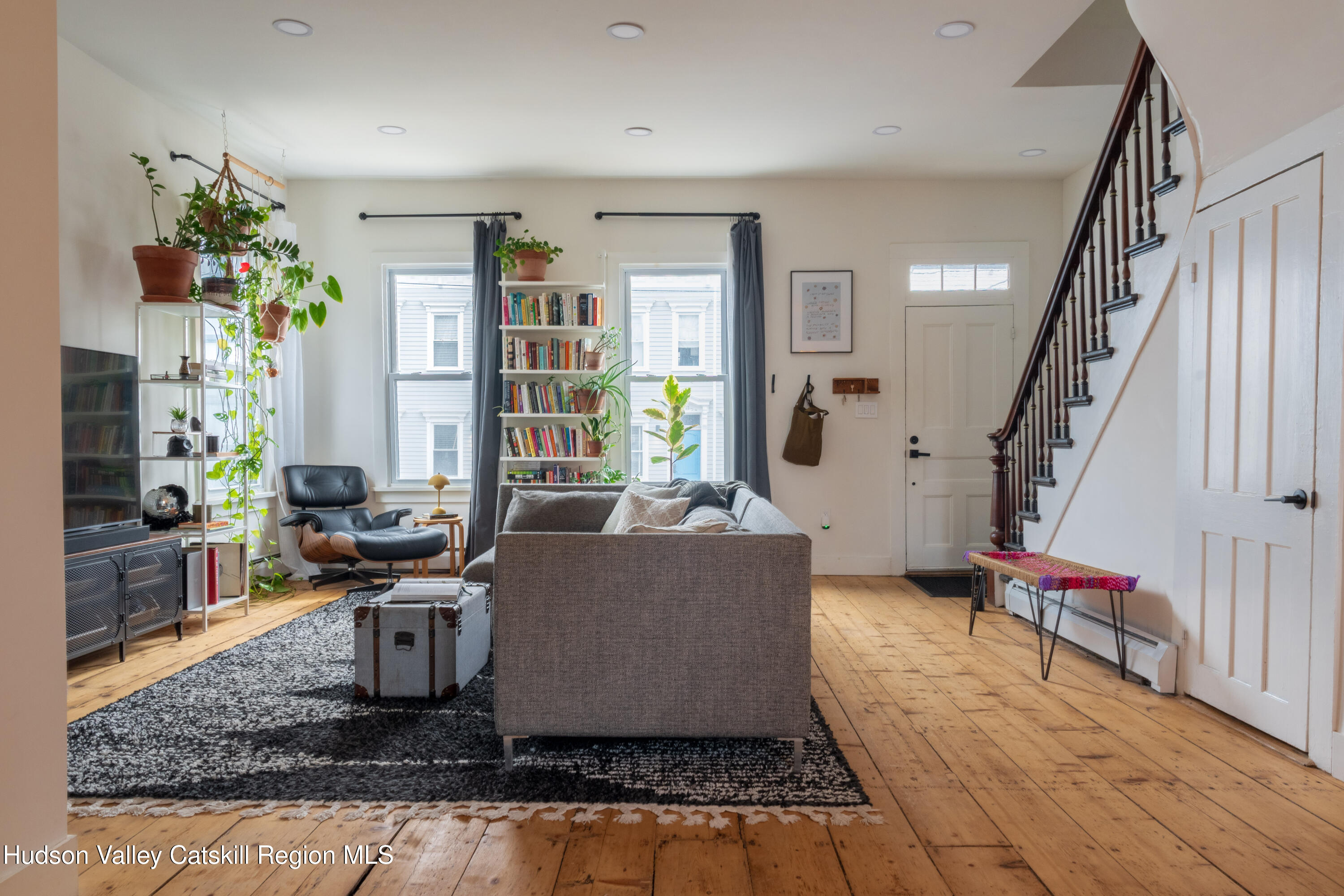 517 State Street Hudson, NY 12534 - Photo 2 of 36 a living room with furniture and wooden floor