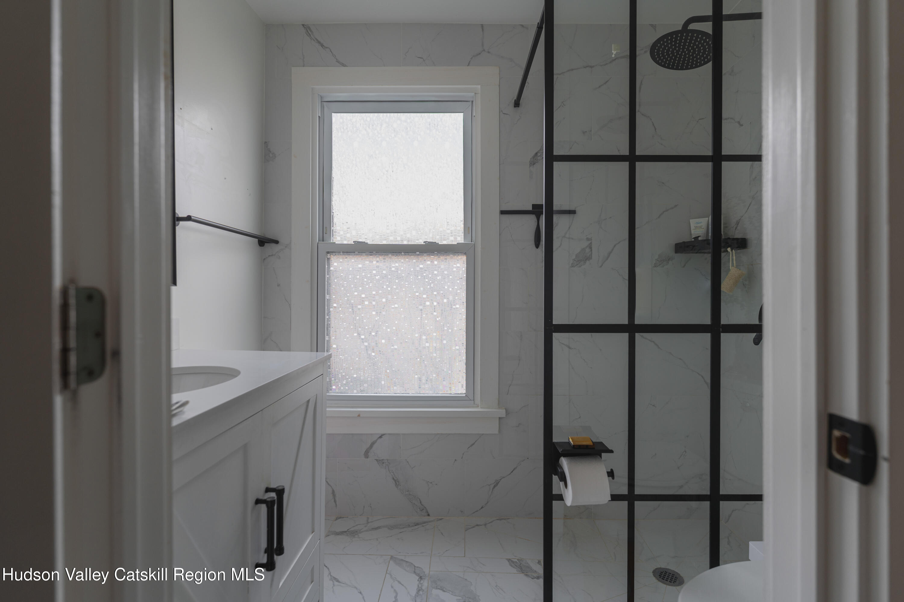 517 State Street Hudson, NY 12534 - Photo 10 of 36 a bathroom with a shower