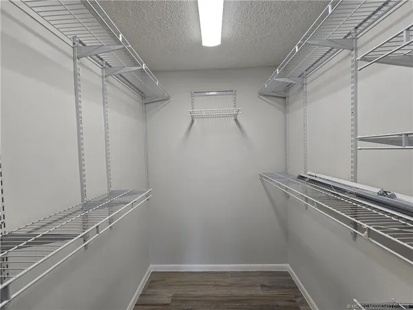 a view of a room with racks on the wall